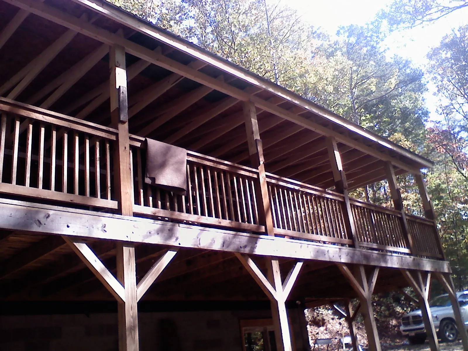 Timber framing under a new elevated porch and deck — Roof Leak Repair in Esmont by Roofing Brothers